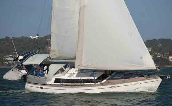 "Before" showing teak deck and soft dodger/bimini "Before" showing teak deck and soft dodger/bimini